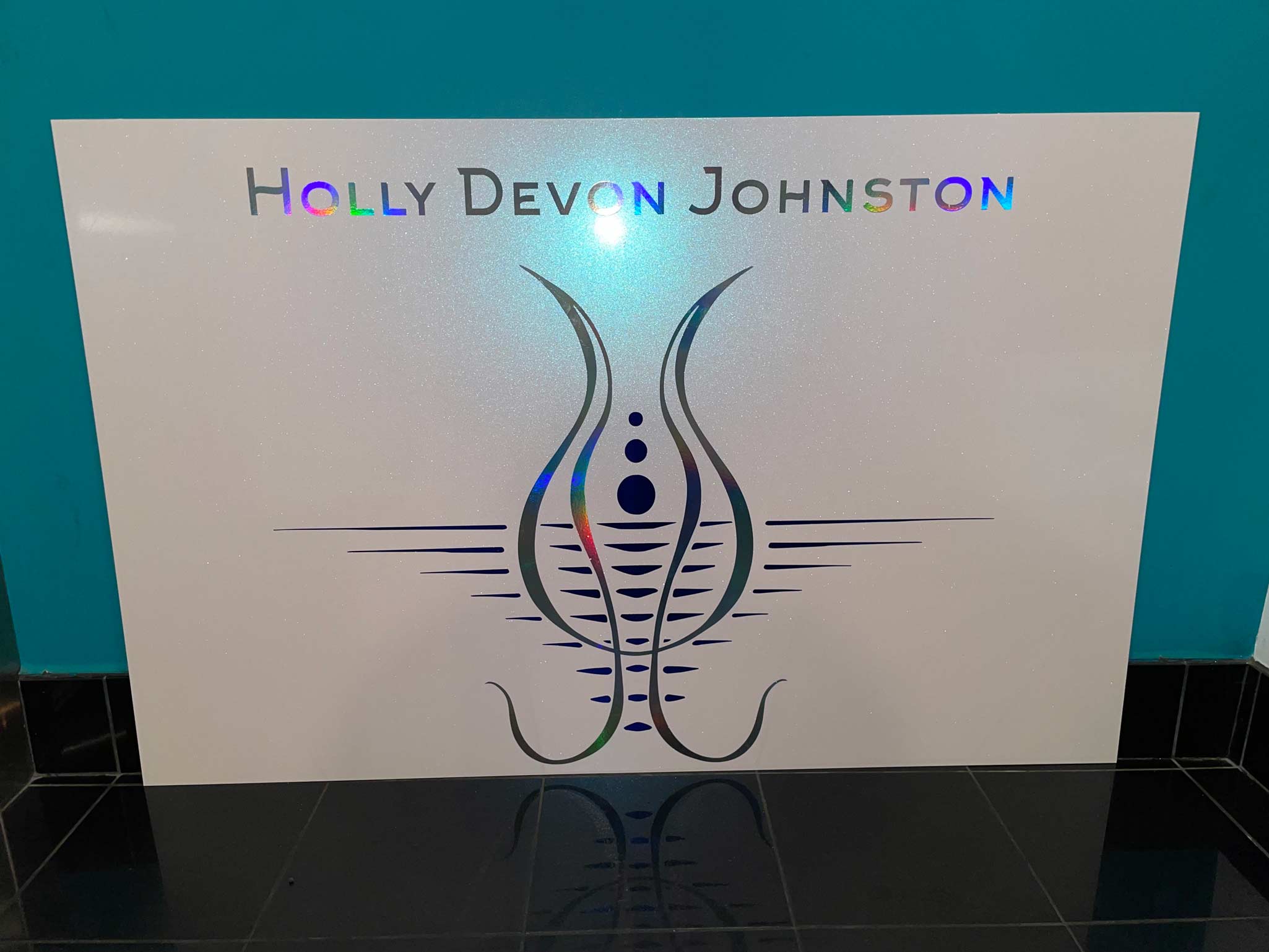 Holly Devon Johnston Tattoo logo